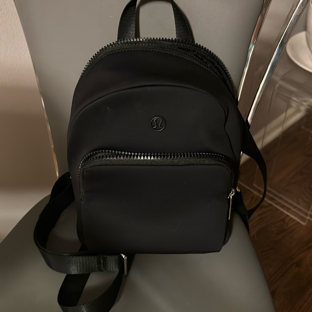 Like New Lululemon Mini Backpack (carried one time only). Black.
